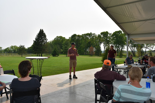 Matt Clark talking to a crowd at a field day on May 30, 2019